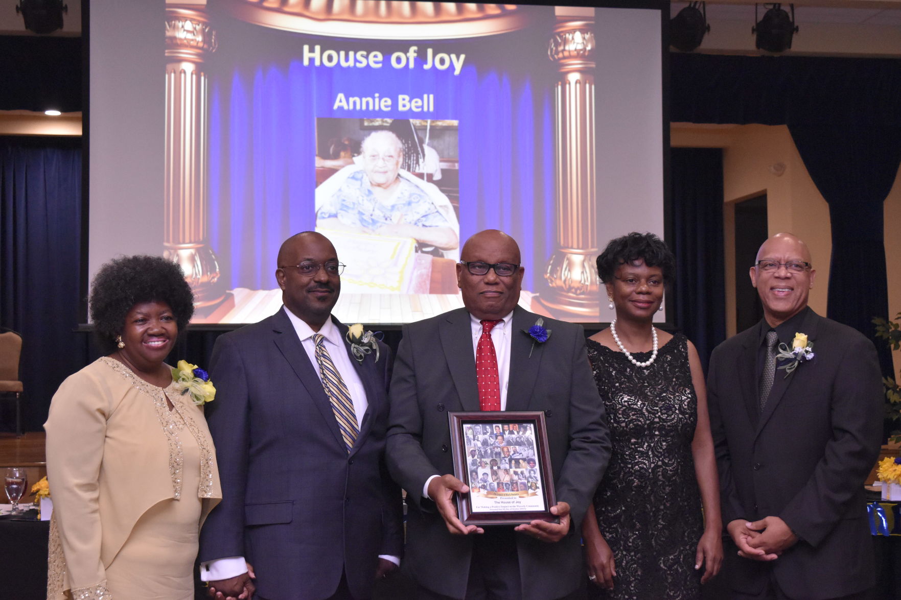 Woodrow Stroman accepts the Legacy Award for his Mom Annie Bell Johnson for The House of Joy.
